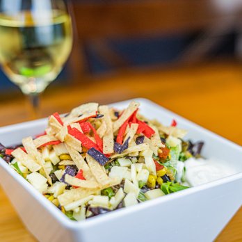 The Hub Eats & Drinks - Southwest Salad paired with a glass of Lava Clap Sauvignon Blanc - American Near Me - Sacramento, California The Hub Eats & Drinks - Southwest Salad paired with a glass of Lava Clap Sauvignon Blanc - American Near Me - Sacramento, California