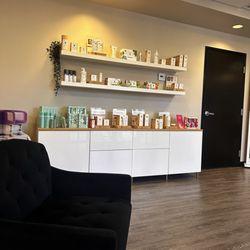 Beauty Secrets Collective - Waiting area with products
