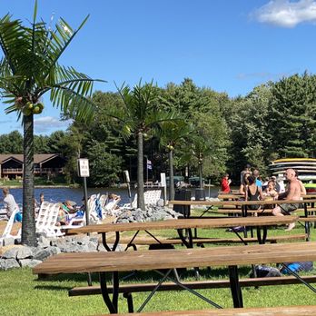 Tiki Beach Bar & Grill - picnic tables and people - American Near Me - Mosinee, Wisconsin