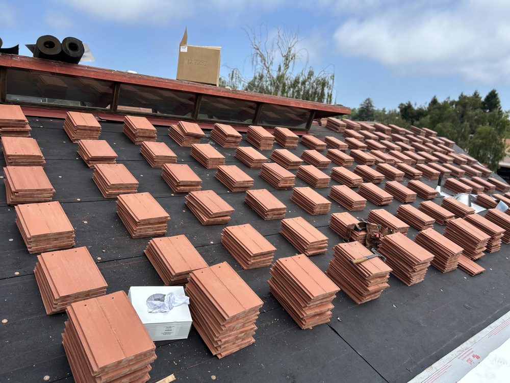 Slide of Six Star Roofing