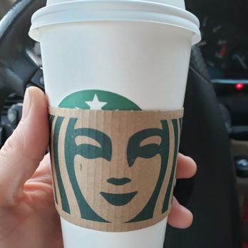 Starbucks - a person holding a starbucks cup in their hand - Coffee & Tea Near Me - Johns Island, South Carolina