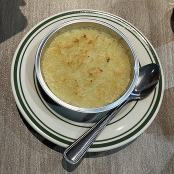 Basil Brazil Cuisine - a bowl of soup on a plate - Brazilian Near Me - San Juan Capistrano, California