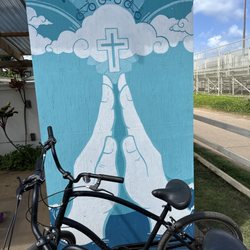 Holoholo Bike Rentals - Sign and bikes