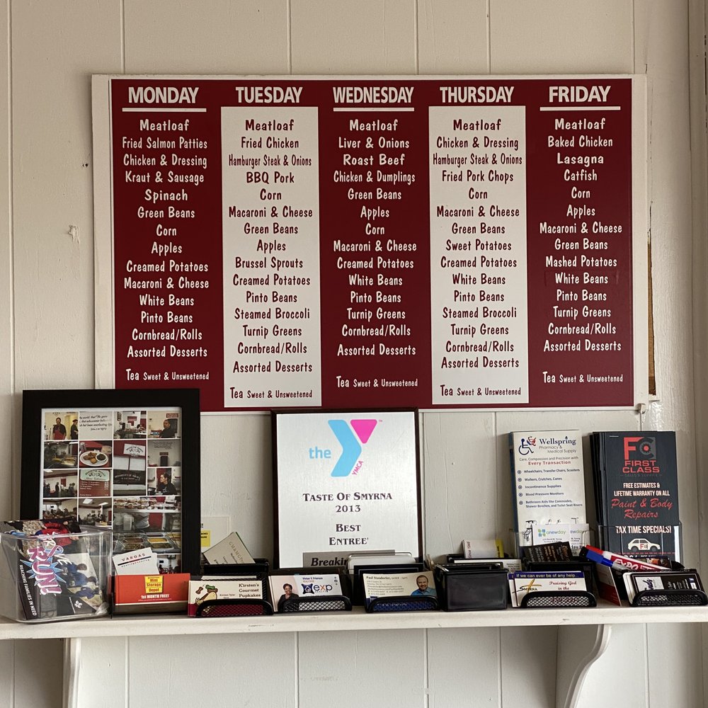 menus on a shelf in a restaurant
