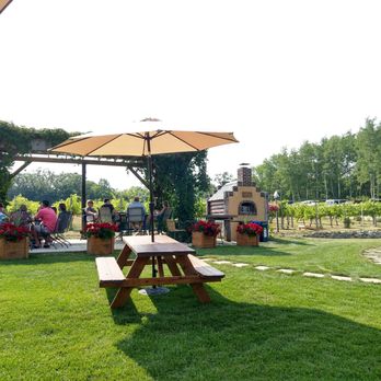 Burr Vineyards - a picnic table with an umbrella - Wineries Near Me - Brandon, Minnesota Burr Vineyards - a picnic table with an umbrella - Wineries Near Me - Brandon, Minnesota