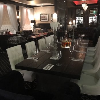 Le Malt Lounge - Inside dining area- chef table and booths in background - Tapas Bars Near Me - Colonia, New Jersey