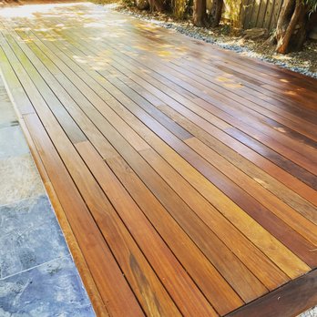 41 Construction - a wooden deck in a backyard - General Contractors Near Me 41 Construction - a wooden deck in a backyard - General Contractors Near Me