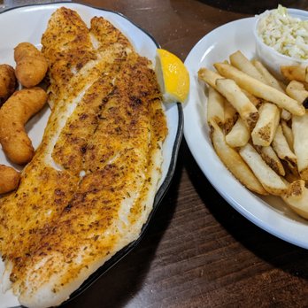 The Fisherman's Galley - Really well-seasoned and perfectly cooked grouper (two pieces) w/complimentary fries and hush puppies and a side of awesome slaw. - Seafood Near Me - Eden, North Carolina The Fisherman's Galley - Really well-seasoned and perfectly cooked grouper (two pieces) w/complimentary fries and hush puppies and a side of awesome slaw. - Seafood Near Me - Eden, North Carolina