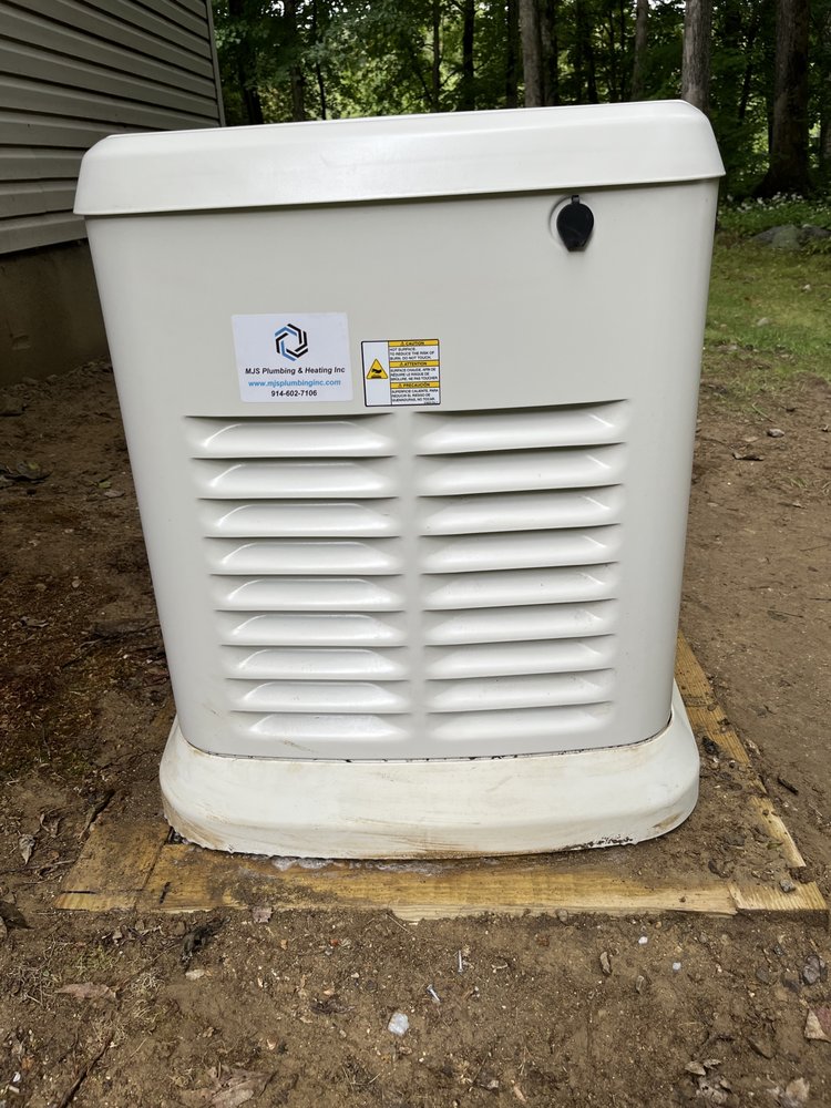 Slide of MJS Plumbing & Heating