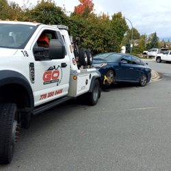 Go Towing & Recovery - Towing a vehicle with a broken engine back to the langley dealership