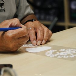 Hand-finished detail work -- the craft behind every order at Name of the Game Embroidery, Orange County.