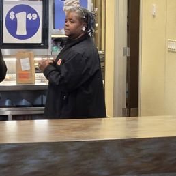 Photo of BK employee that put returned food back into the service tray instead of tossing it in trash.