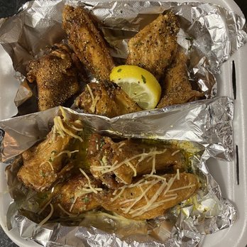 Outlaw Wings - Lemon Pepper (top) and Garlic Parmesan (bottom) - Chicken Wings Near Me - Broomfield, Colorado Outlaw Wings - Lemon Pepper (top) and Garlic Parmesan (bottom) - Chicken Wings Near Me - Broomfield, Colorado