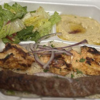 LaShish Greek & Mediterranean - Kebab combo with hummus and marinated salad comes with rice and chicken and I believe a combo kebab chicken, beef, and lamb I believe - Mediterranean Near Me - Allen, Texas