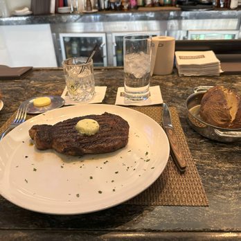 Delmonico Steakhouse - Boneless ribeye steak, and baked potato - Steakhouses Near Me - Las Vegas, Nevada
