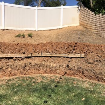 Shafer Landscape - Work in progress. Our hill sloped towards the house AND down the fence line. A multidimensional challenge! - Landscaping Near Me Shafer Landscape - Work in progress. Our hill sloped towards the house AND down the fence line. A multidimensional challenge! - Landscaping Near Me
