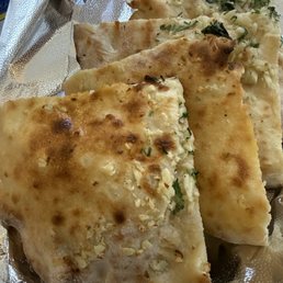 Garlic naan - like a cross between naan and focaccia Garlic naan - like a cross between naan and focaccia