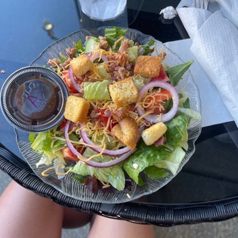 The Wine Factory - a plate of salad on a table - Caterers Near Me - Cheraw, South Carolina The Wine Factory - a plate of salad on a table - Caterers Near Me - Cheraw, South Carolina