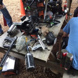 Fox Brother's Paintball Supplies - Table full of guns