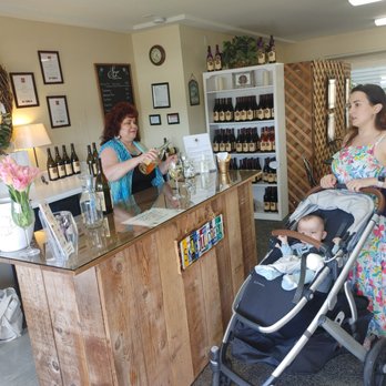 Skagit Crest Vineyard & Winery - a woman and a baby in a stroller - Wine Tasting Room Near Me - La Conner, Washington Skagit Crest Vineyard & Winery - a woman and a baby in a stroller - Wine Tasting Room Near Me - La Conner, Washington