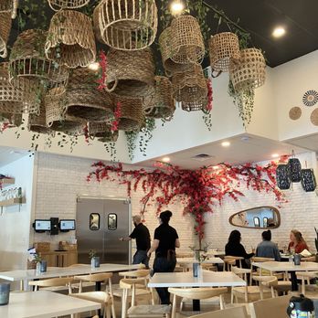 Spiro's Taverna of Wellington - Inside - baskets on ceiling and more tables - Greek Near Me - Wellington, Florida