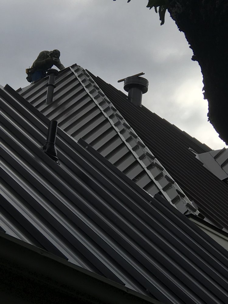 Slide of Masters Roofing & Construction