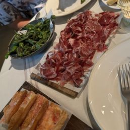 Iberian ham plate, potatoes gravas, roasted peppers Iberian ham plate, potatoes gravas, roasted peppers