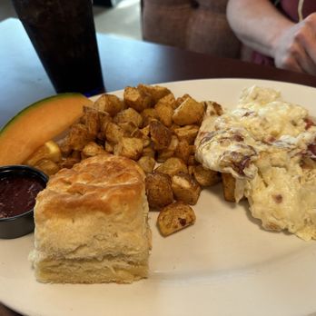 Hash House a Go Go - Farmhouse Egg White Scramble with ham, onion and cheddar. Biscuit and crispy fried potatoes. Huge portion and delicious!! - Cocktail Bars Near Me - Winter Garden, Florida