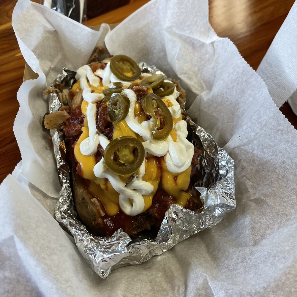 This stuff baked potato was to die for. Honestly, everything there has a great flavor, the nachos, the brisket, the meatloaf and This stuff baked potato was to die for. Honestly, everything there has a great flavor, the nachos, the brisket, the meatloaf and