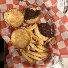 a basket of hamburgers and fries a basket of hamburgers and fries