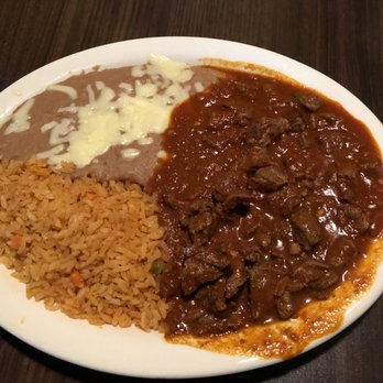 La Botana - Chile Colorado meal that came with refried beans topped with cheese, Spanish rice and flour tortillas. - Tex-Mex Near Me - Atlanta, Georgia