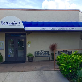 Backwaters on Sand Key - Front. At the end of strip. Easily missed as awning is recessed from strip signs. - Seafood Near Me - Clearwater Beach, Florida Backwaters on Sand Key - Front. At the end of strip. Easily missed as awning is recessed from strip signs. - Seafood Near Me - Clearwater Beach, Florida