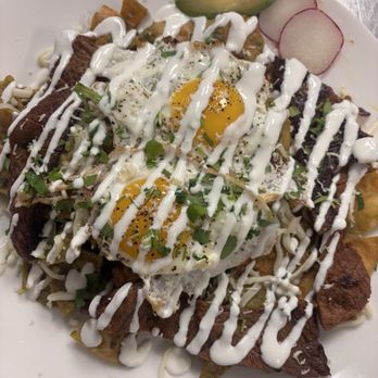 Mariscos El Picudo - Chilaquiles Verdes with steak and eggs - Seafood Near Me - Tulare, California Mariscos El Picudo - Chilaquiles Verdes with steak and eggs - Seafood Near Me - Tulare, California