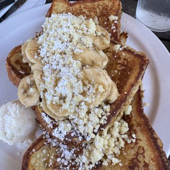 Kihei Caffe Lahaina - French Toast with Macadamia nuts and bananas. - Breakfast & Brunch Near Me - Lahaina, Hawaii Kihei Caffe Lahaina - French Toast with Macadamia nuts and bananas. - Breakfast & Brunch Near Me - Lahaina, Hawaii