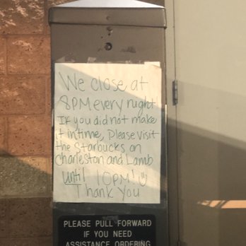 Starbucks - a sign posted on a post in front of a coffee shop - Coffee & Tea Near Me - Las Vegas, Nevada