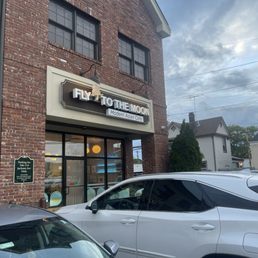 Exterior outside entrance of Fly Me To The Moon - Syosset, New York Exterior outside entrance of Fly Me To The Moon - Syosset, New York