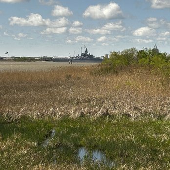 Felix's Fish Camp - View of the battleship USS Alabama museum. - Seafood Near Me - Spanish Fort, Alabama Felix's Fish Camp - View of the battleship USS Alabama museum. - Seafood Near Me - Spanish Fort, Alabama