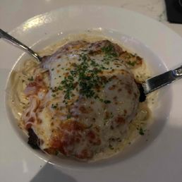 Chicken parm on top of fettuccine Alfredo Chicken parm on top of fettuccine Alfredo