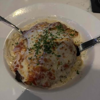 Villa Castrioti - Chicken parm on top of fettuccine Alfredo - Italian Near Me - Nashville, Tennessee Villa Castrioti - Chicken parm on top of fettuccine Alfredo - Italian Near Me - Nashville, Tennessee