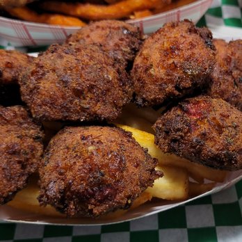 Emerald City Fish & Chips - Crab Puppies (6) and Chips, $9.95 - 3.5 Stars - Fish & Chips Near Me - Seattle, Washington Emerald City Fish & Chips - Crab Puppies (6) and Chips, $9.95 - 3.5 Stars - Fish & Chips Near Me - Seattle, Washington