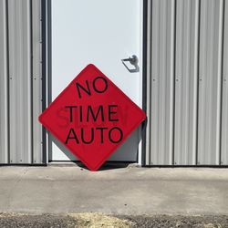 No Time Auto - Business name on sign