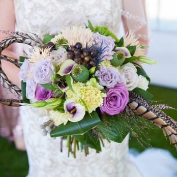 Stems Flowers & Cafe - a bride holding a bouquet - Florists Near Me - Red Deer, Alberta Stems Flowers & Cafe - a bride holding a bouquet - Florists Near Me - Red Deer, Alberta