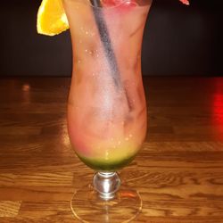 Garfield's Restaurant & Pub - Jamaican Me Crazy...Malibu Coconut Rum,Midori Melon Liqueur, Orange Juice,and Cranberry Juice