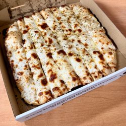 Big Cheese Pizza - Cheesy garlic bread sticks were delicious