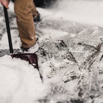 Two Seasons Services - a person shoveling snow - Snow Removal Near Me - Anchorage, Alaska Two Seasons Services - a person shoveling snow - Snow Removal Near Me - Anchorage, Alaska