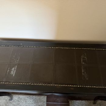 NF Moving - Tape taped on leather sofa table - Movers Near Me