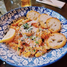 bowl of pasta and bread bowl of pasta and bread