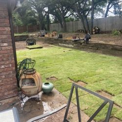 Camacho Tree Service & Landscaping - No drop-off from patio to grass. And no grading AWAY from the patio. Now water flows ONTO patio (and toward my house) from the yard.