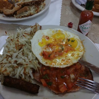 Harry's Cafe - Undercooked hash Browns and overcooked ham and eggs. Couldn't even finish it stomach didn't agree with it - Breakfast & Brunch Near Me - Huntington Beach, California
