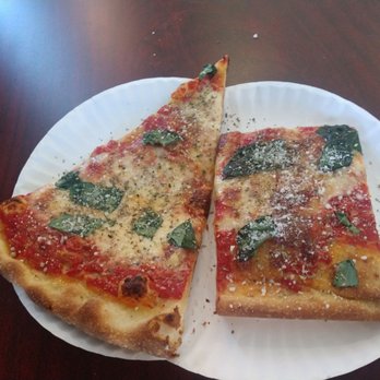 Slices Pizza - One regular and one grandma slice. - Pizza Near Me - Melbourne, Florida